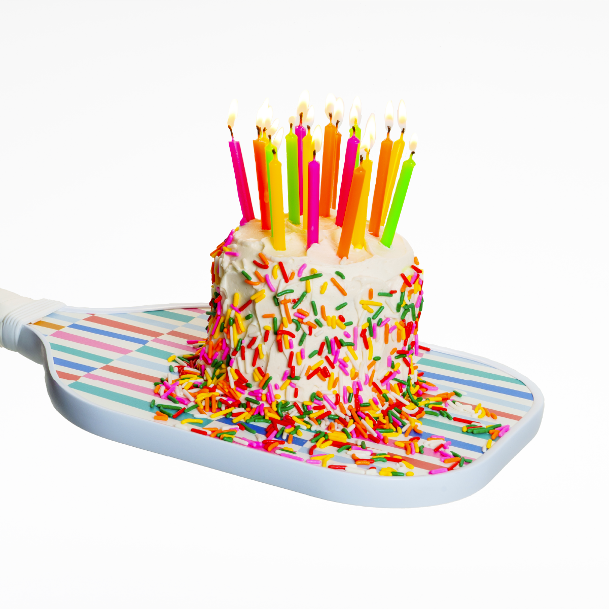 Birthday cake with candles on a pickleball paddle