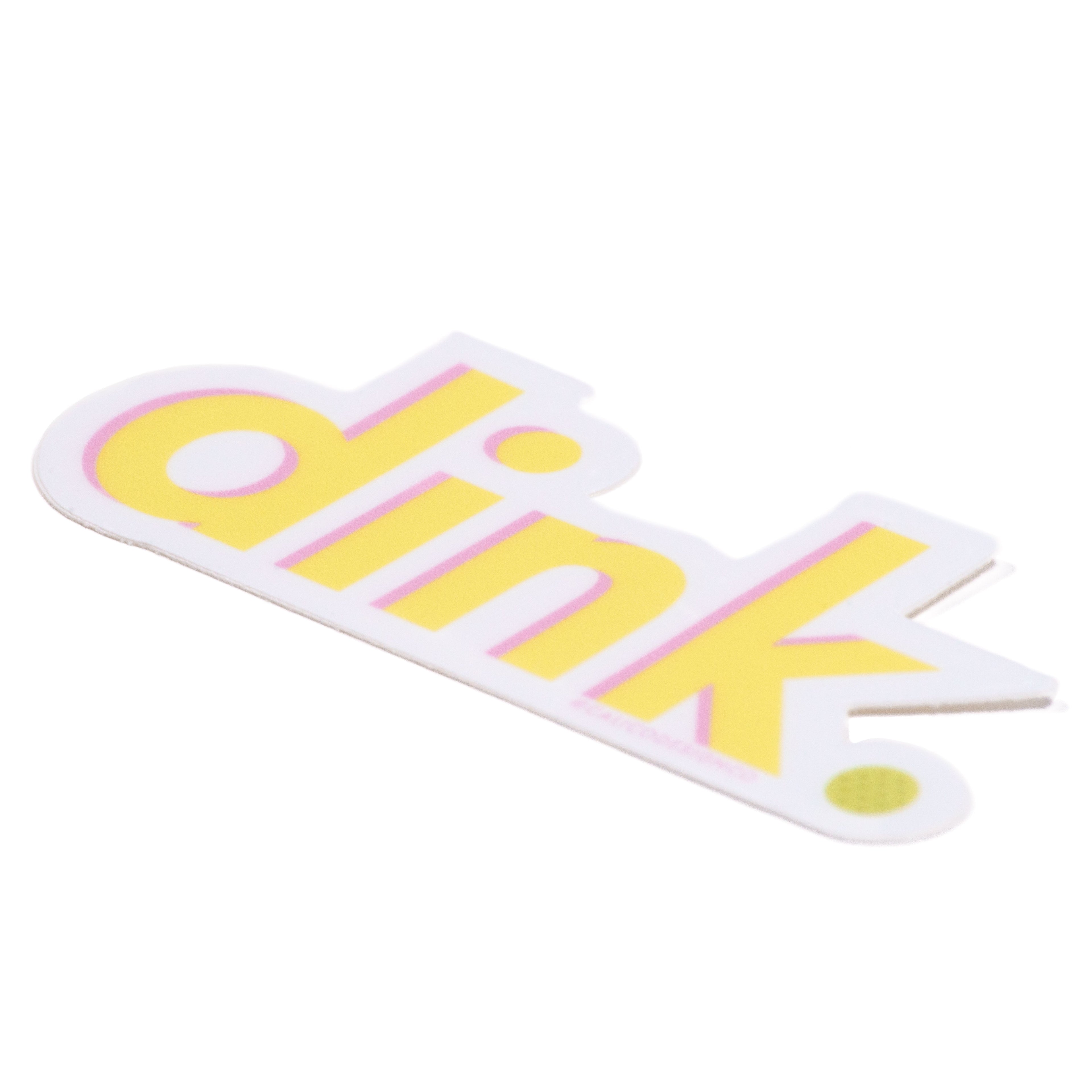 Side view of yellow and pink humorous pickleball sticker that says &quot;dink.&quot;