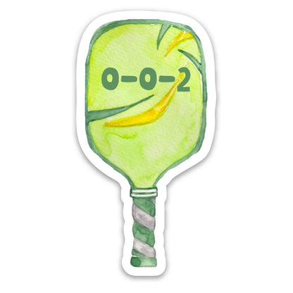 Green sticker shaped like a pickleball paddle that says 0-0-2 on it