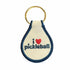 Red white and blue keychain that says "I heart pickleball" on it