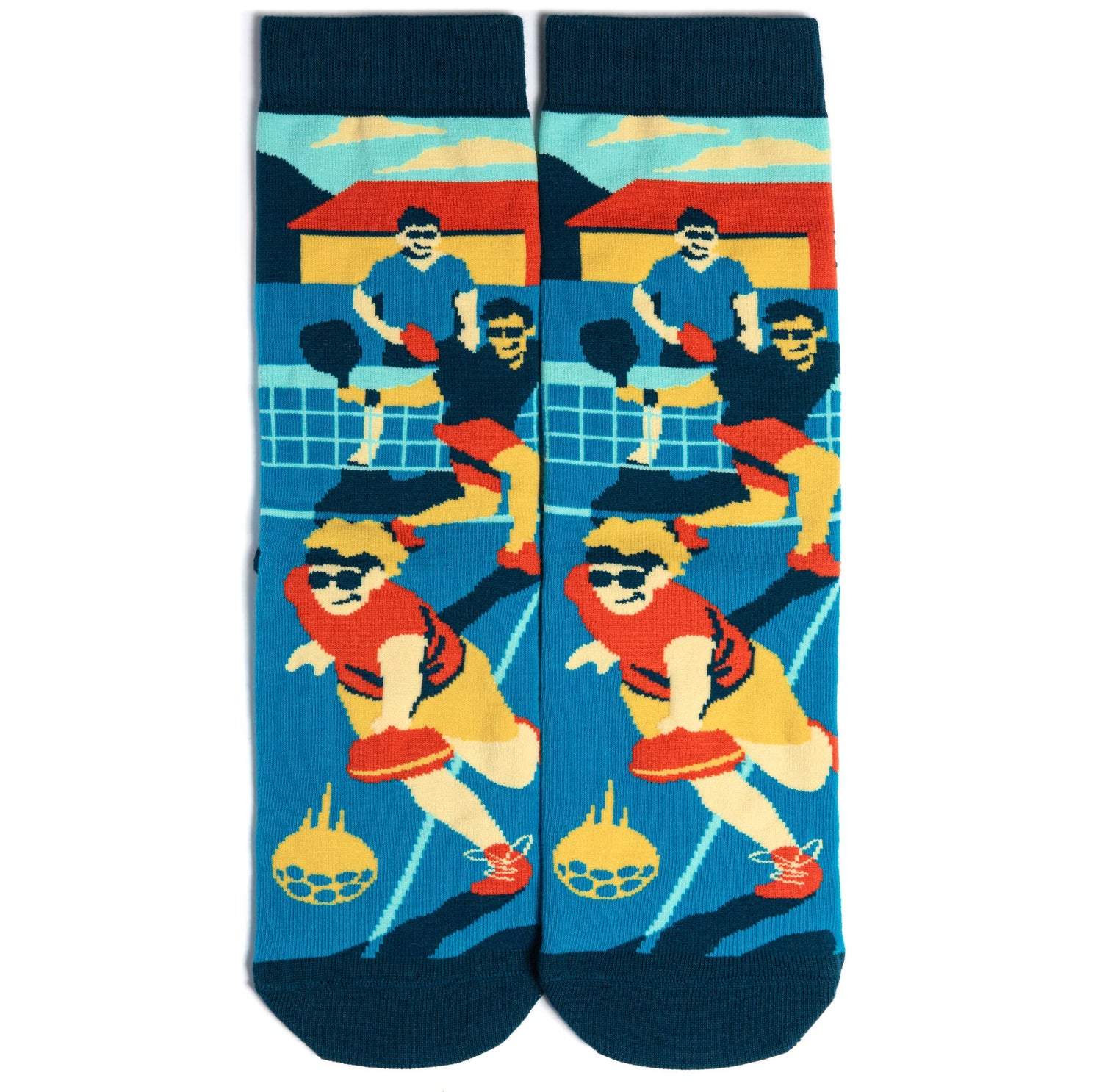 Humorous blue socks with people playing pickleball on them