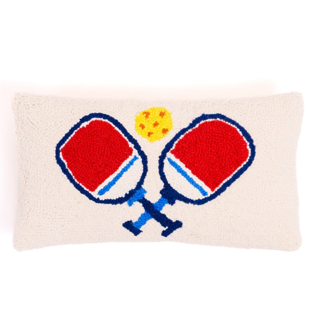 Hook pillow featuring two pickleball paddles and one pickleball