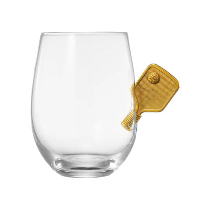 Stemless wine glass with a metal pickleball paddle embedded into the glass