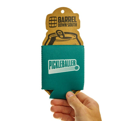 Green drink coozie that says Pickleballer on it being held in hand