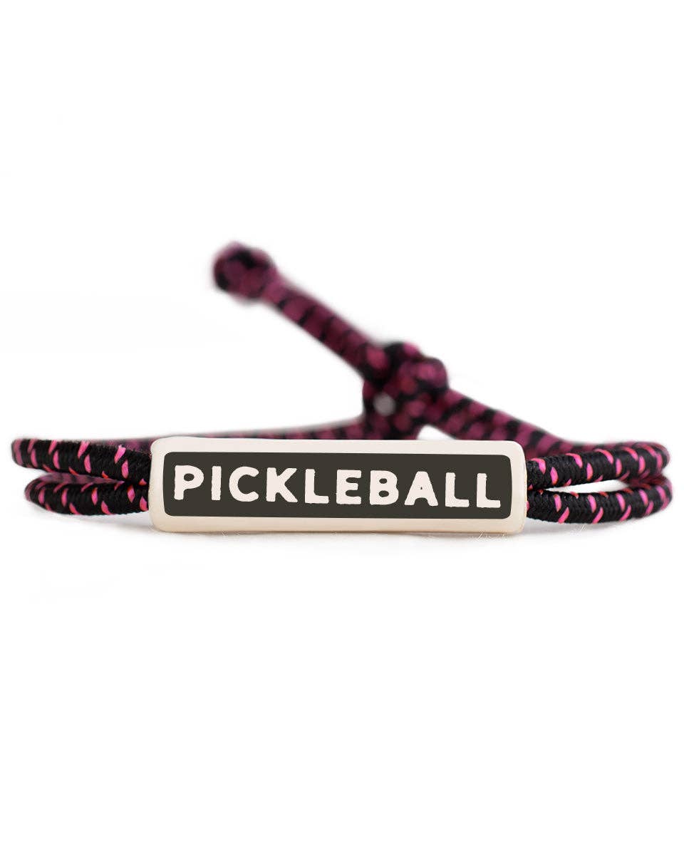 Pink and black colored rope bracelet that says &quot;PICKLEBALL&quot; on it