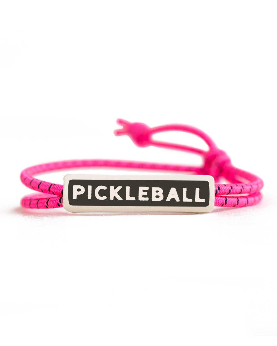 Pink colored rope bracelet that says &quot;PICKLEBALL&quot; on it