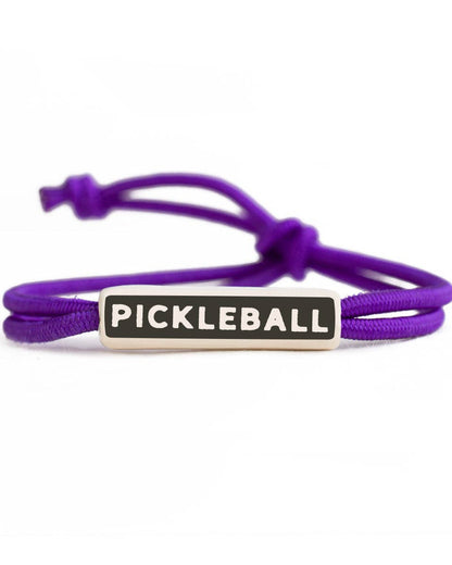 Purple colored rope bracelet that says &quot;PICKLEBALL&quot; on it