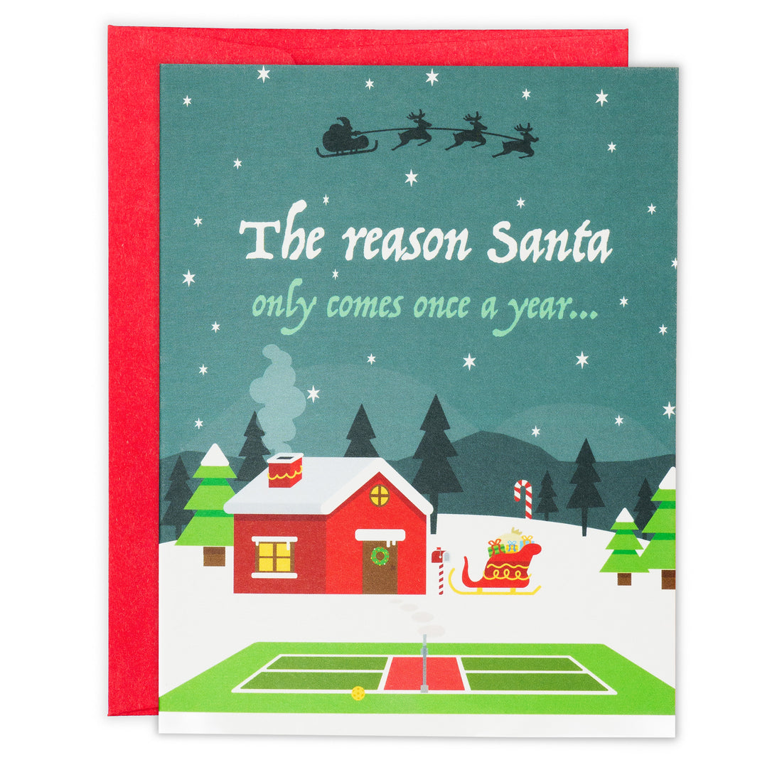 Pickleball themed Christmas greeting card showing Santas home in the north pole with a pickleball court in the front laying flat with a red envelope.