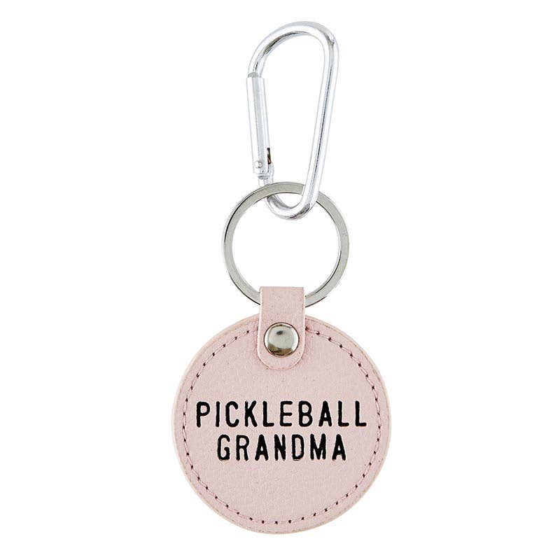 Round pink keychain that says &quot;PICKLEBALL GRANDMA&quot; on it