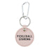 Round pink keychain that says "PICKLEBALL GRANDMA" on it